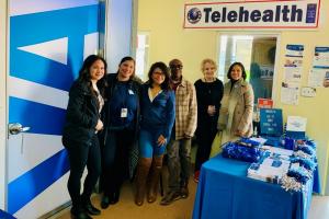 VA telehealth representatives at an event. 